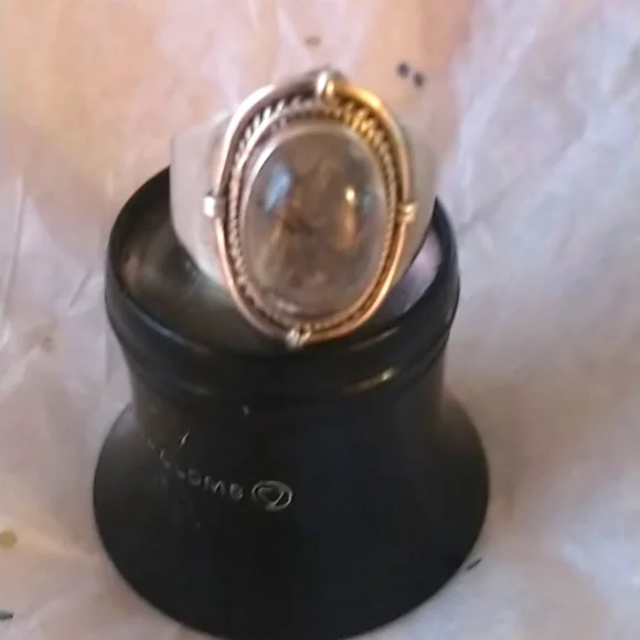 Silver stone has fossil inside, size 7. - Picture 5 of 7